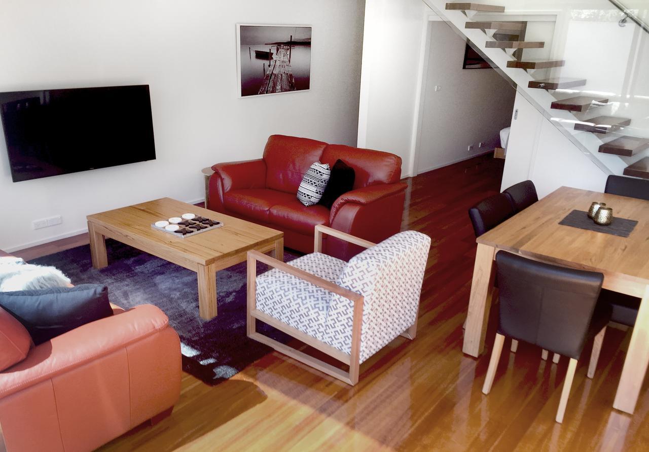 Sullivans Cove Apartments Hobart Exteriör bild A living room